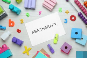 ABA Therapy sign among toys