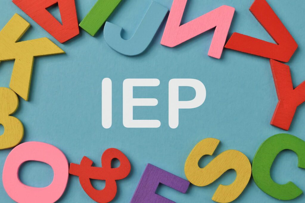 Graphic of Autism IEP with letters and symbols