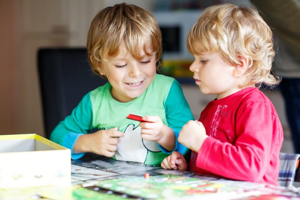 two young children with autism playing together peacefully