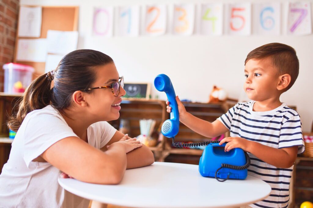 therapist doing occupational therapy with children with autism